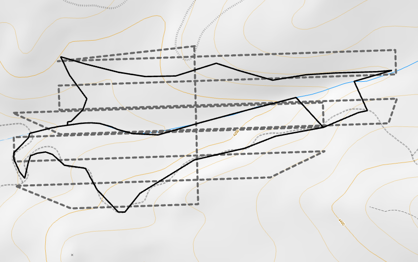 The flight plan criss-crosses horizontally across the sloped project area